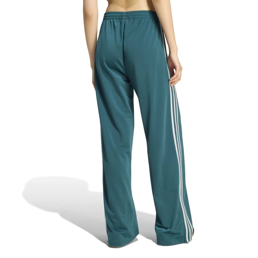 Adidas - Pantaloni della tuta Firebird con vestibilità ampia - donna